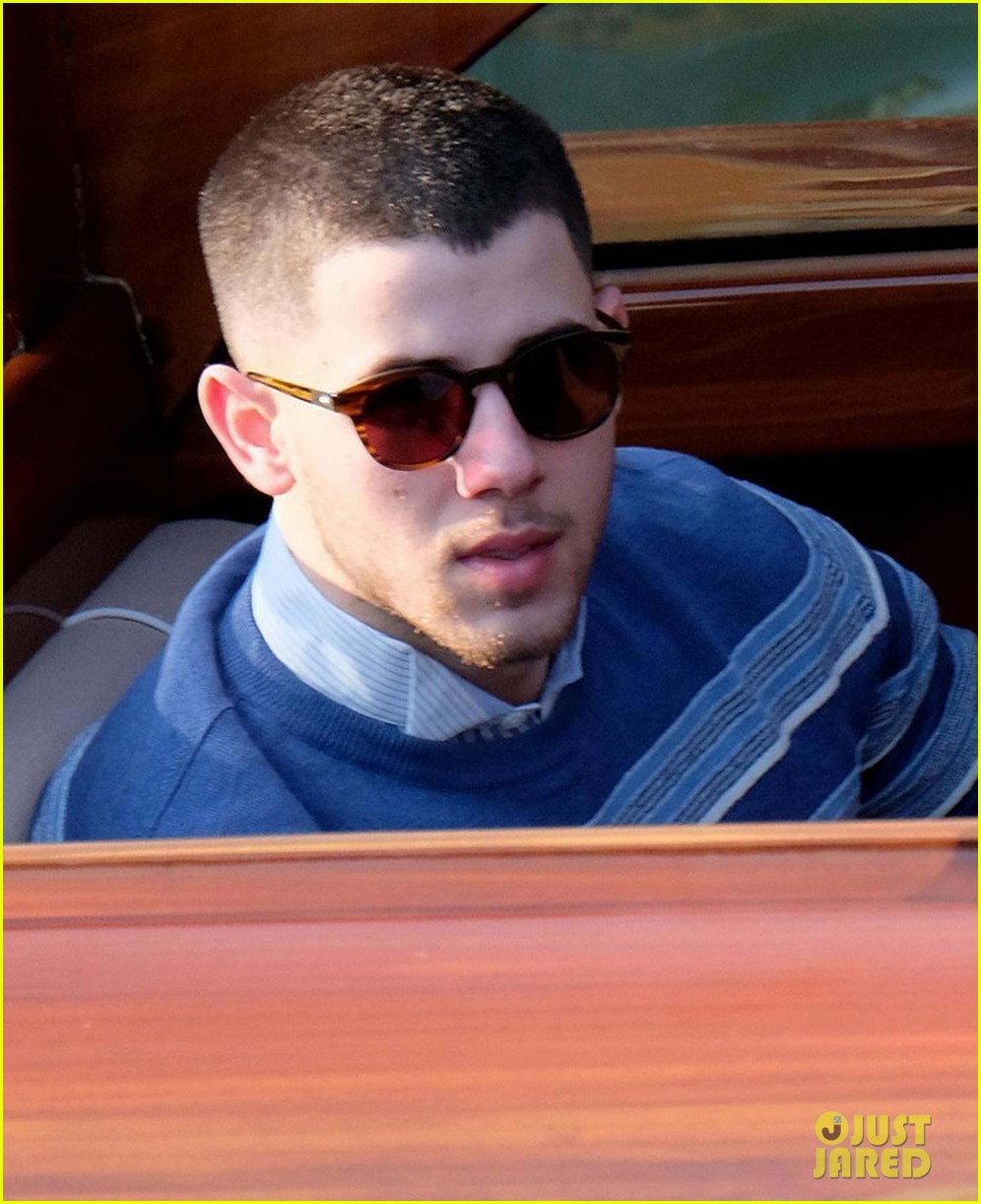 nick jonas wraps up european vacation time to get back to work 03