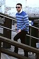 nick jonas wraps up european vacation time to get back to work 02