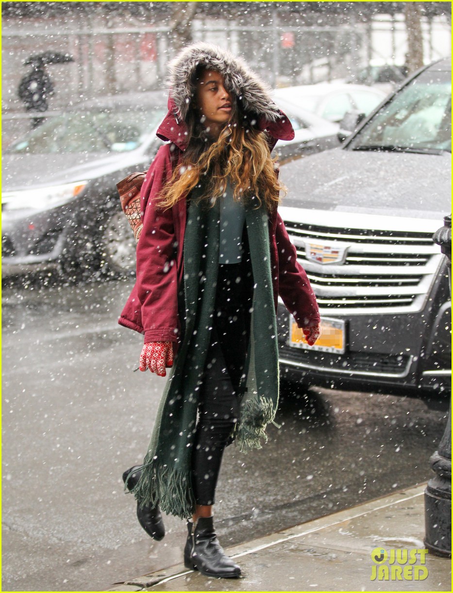 malia obama braves the snowy weather en route to her internship 01