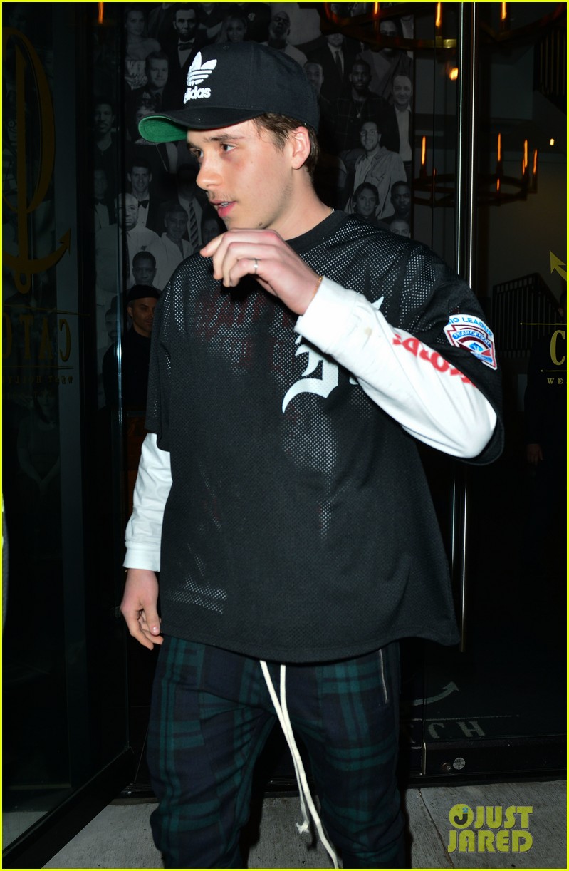 brooklyn beckham covers up his new tattoo during night out with friend 02