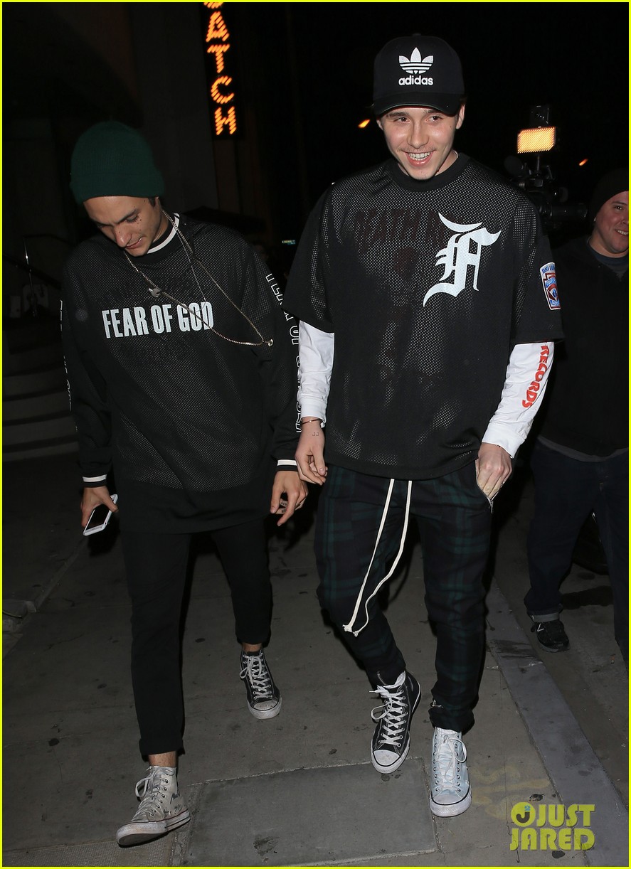 brooklyn beckham covers up his new tattoo during night out with friend 03