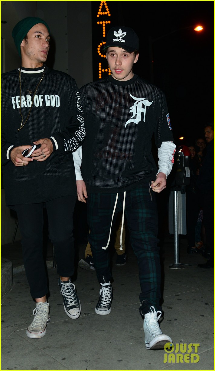 brooklyn beckham covers up his new tattoo during night out with friend 07
