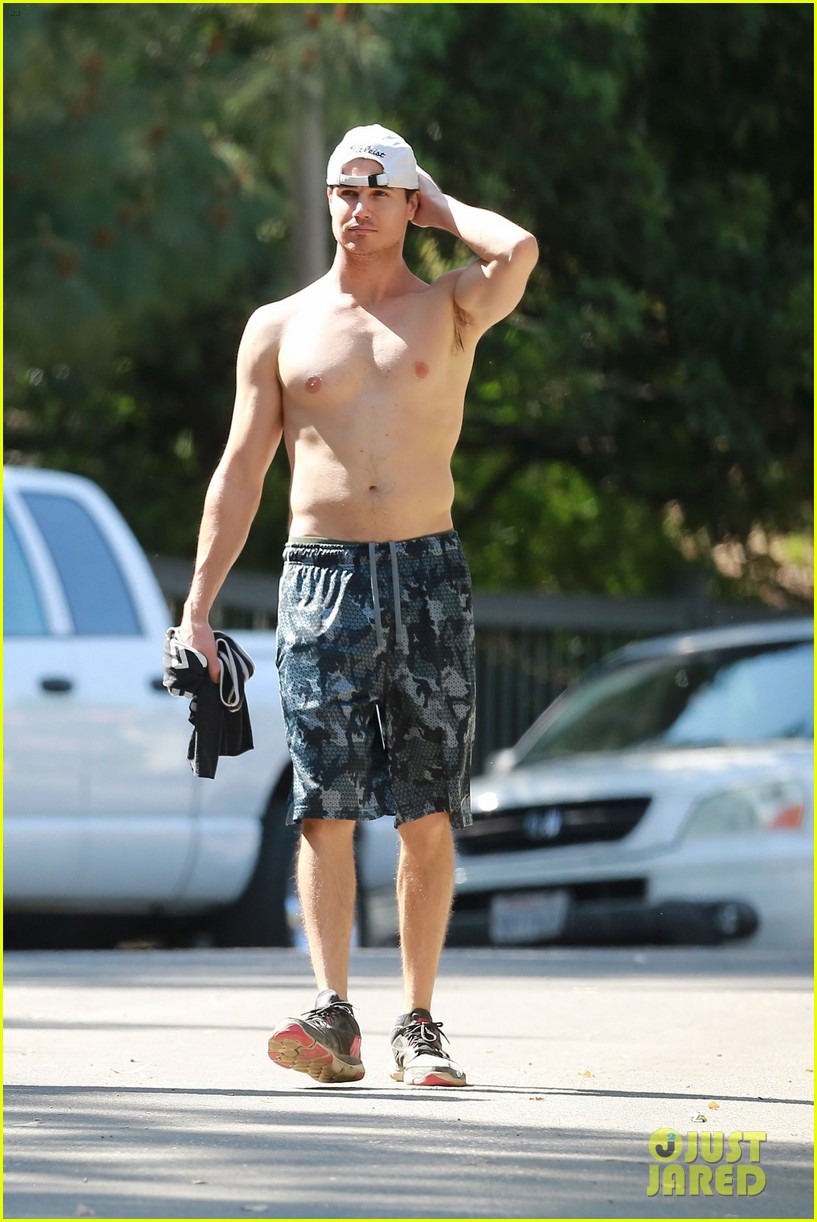 robbie amell goes shirtless on a hike 03