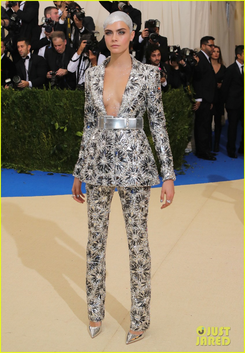 cara covers her bald head with crystals at met01