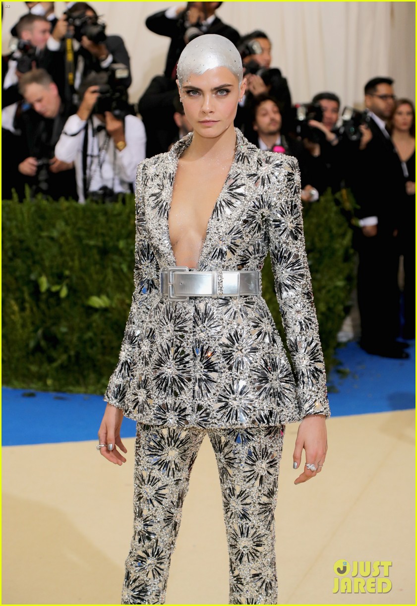 cara covers her bald head with crystals at met03