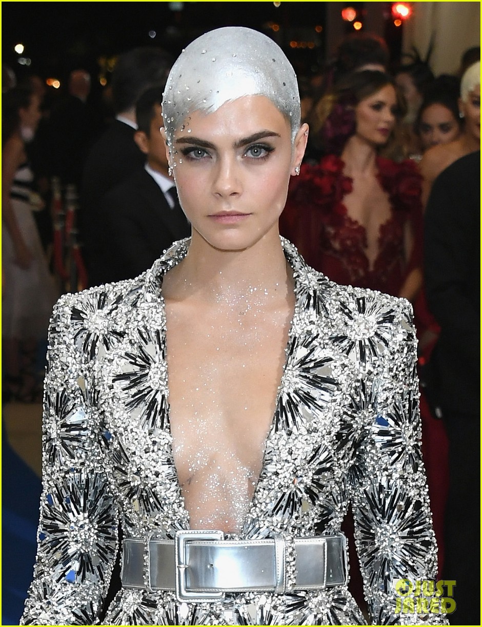 cara covers her bald head with crystals at met05