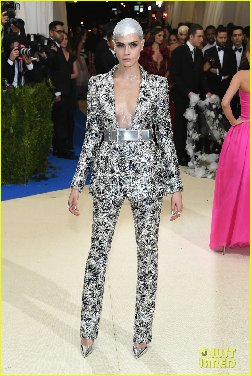 cara covers her bald head with crystals at met07