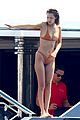 bella hadid jumps off a yacht in her bikini 01