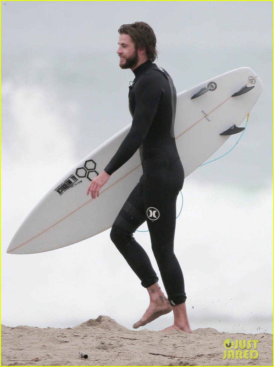 liam hemsworth hits the waves to kick off weekend 04