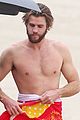liam hemsowrth goes shirtless while surfing in malibu02