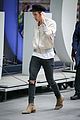 harry styles looks stylish while performing new songs from debut album 09