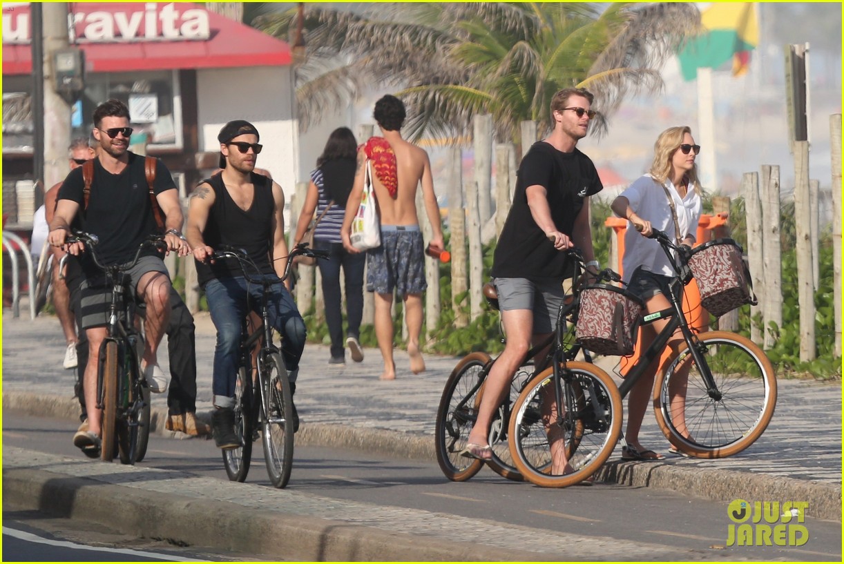 paul wesley candice king hit the beach in rio 03