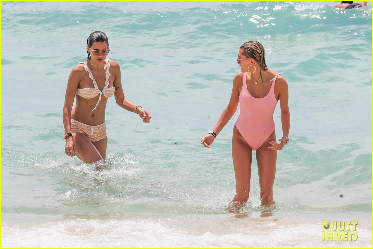 hailey baldwin enjoys miami beach in her pink swimsuit 13