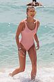 hailey baldwin enjoys miami beach in her pink swimsuit 07
