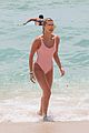 hailey baldwin enjoys miami beach in her pink swimsuit 15