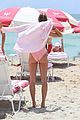 hailey baldwin enjoys miami beach in her pink swimsuit 19