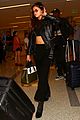 selena gomez shows off her abs while heading to her flight 08