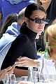 bella hadid goes braless for chic parisian lunch date 02