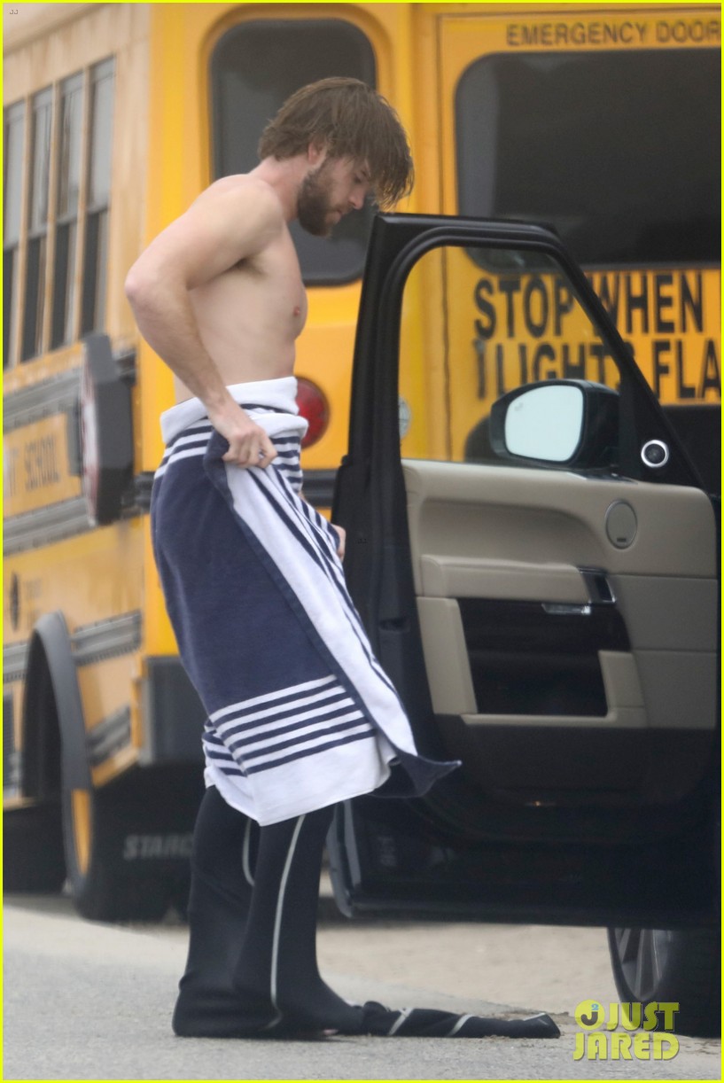 liam hemsworth strips out of wetsuit to reveal ripped abs 49