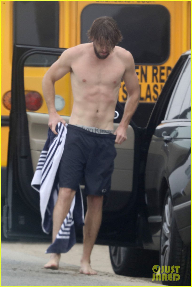 liam hemsworth strips out of wetsuit to reveal ripped abs 54