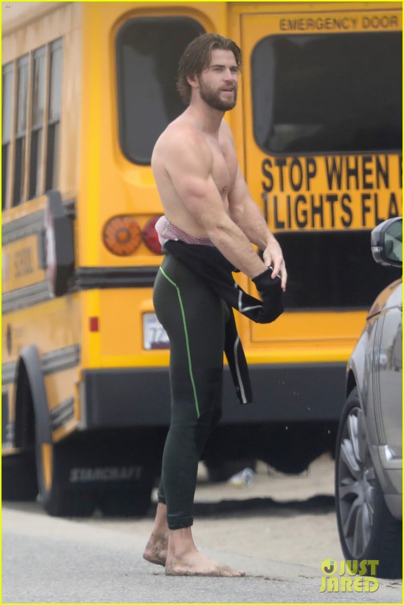 liam hemsworth strips out of wetsuit to reveal ripped abs 61