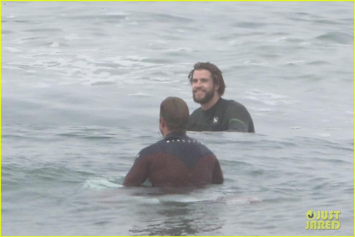 liam hemsworth strips out of wetsuit to reveal ripped abs 64