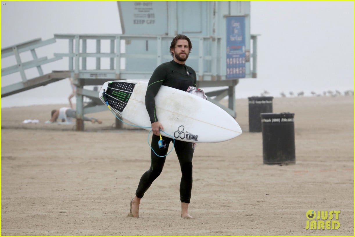 liam hemsworth strips out of wetsuit to reveal ripped abs 72