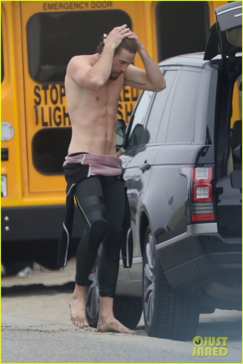 liam hemsworth strips out of wetsuit to reveal ripped abs 76