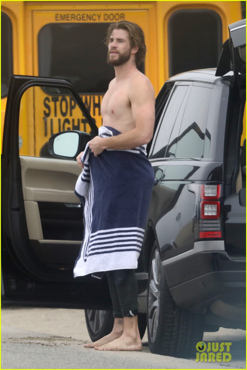 liam hemsworth strips out of wetsuit to reveal ripped abs 78