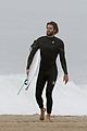 liam hemsworth strips out of wetsuit to reveal ripped abs 33