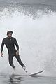 liam hemsworth strips out of wetsuit to reveal ripped abs 57