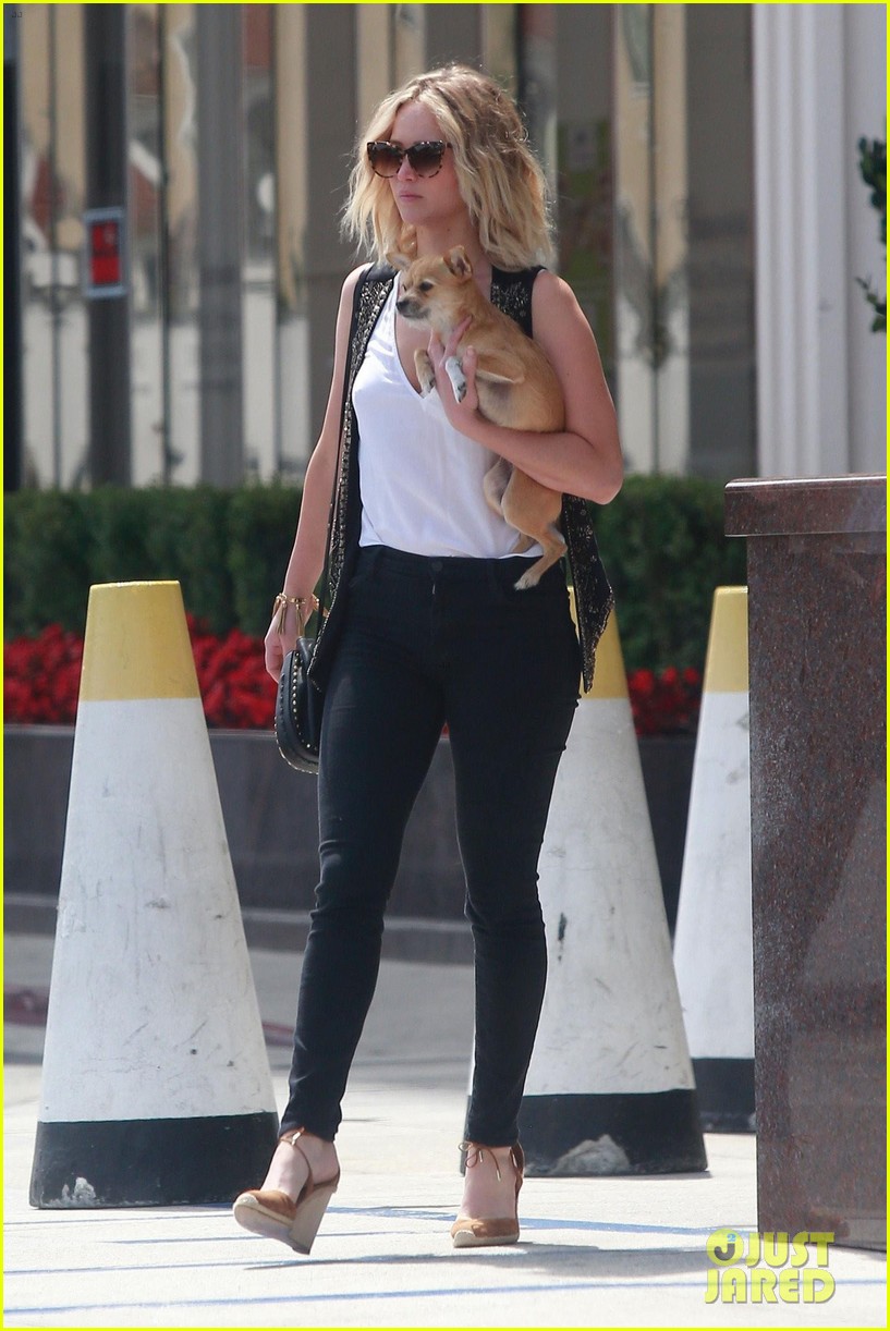 jennifer lawrence holds her dog close while out in westwood 03