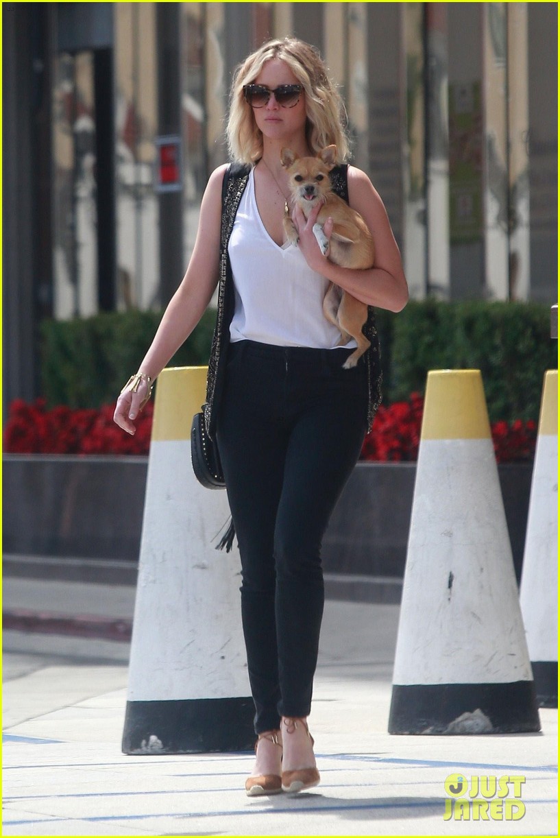 jennifer lawrence holds her dog close while out in westwood 05