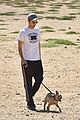 robert pattinson takes his pup for a walk 01