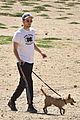 robert pattinson takes his pup for a walk 05