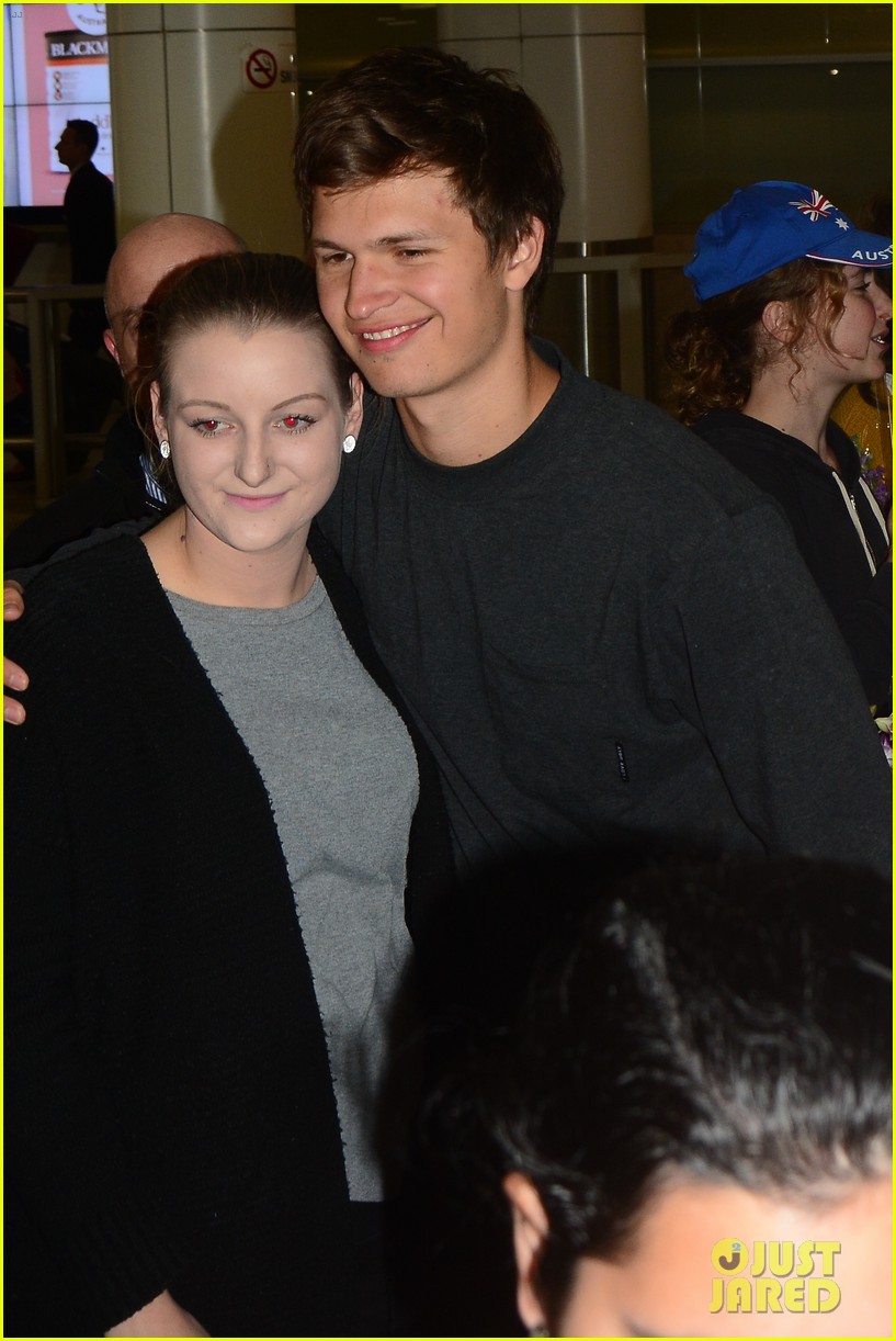 ansel elgort gets greeted by fans at australia airport 04