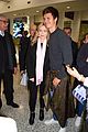 ansel elgort gets greeted by fans at australia airport 01