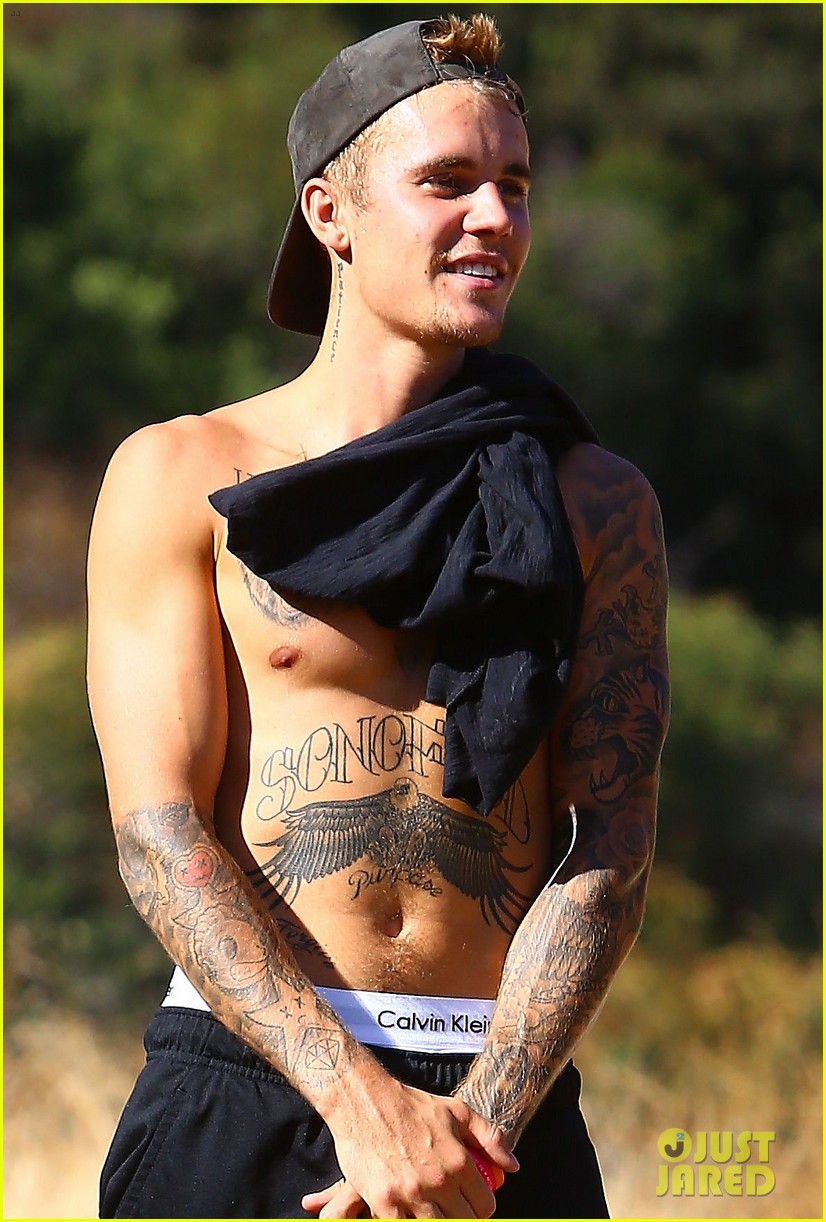 justin bieber goes shirtless on hike with female friend 02