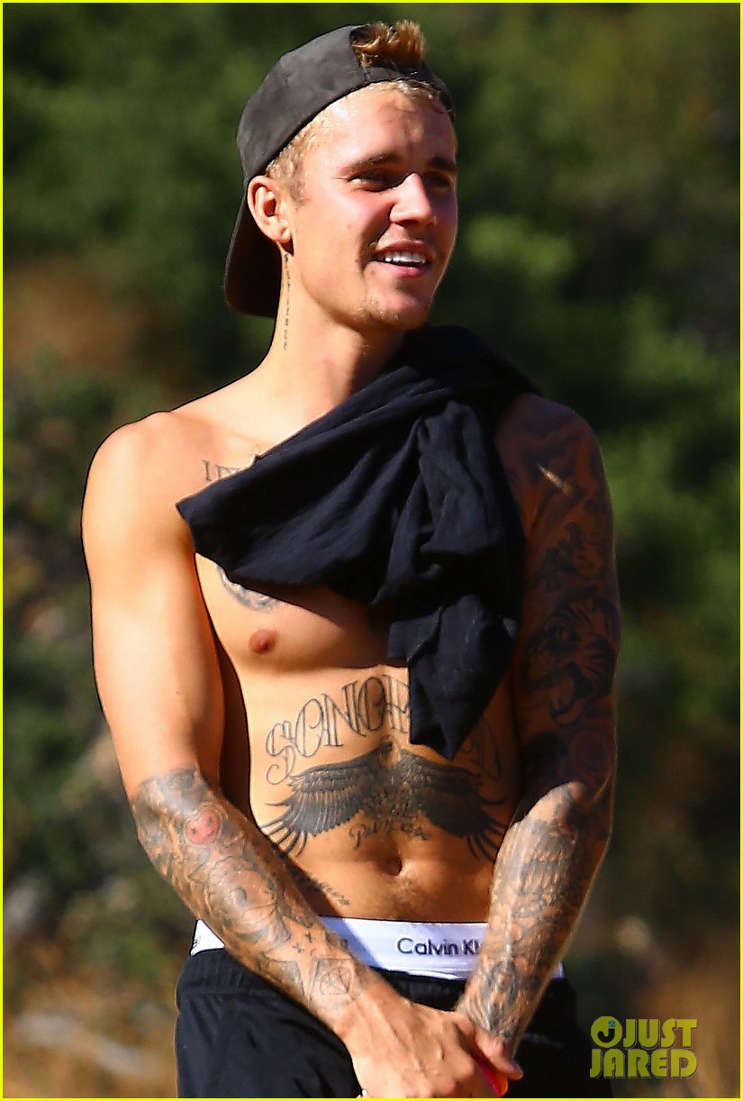 justin bieber goes shirtless on hike with female friend 06