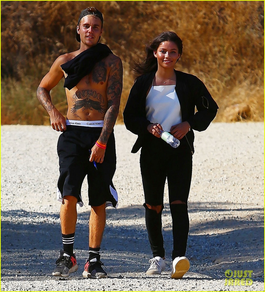 justin bieber goes shirtless on hike with female friend 07