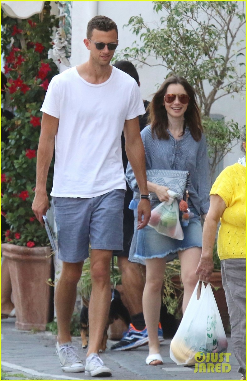 lily collins kisses jason vahn during pda filled trip to italy 05