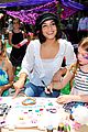 vanessa hudgens snaps selfies with fans at toy launch 03