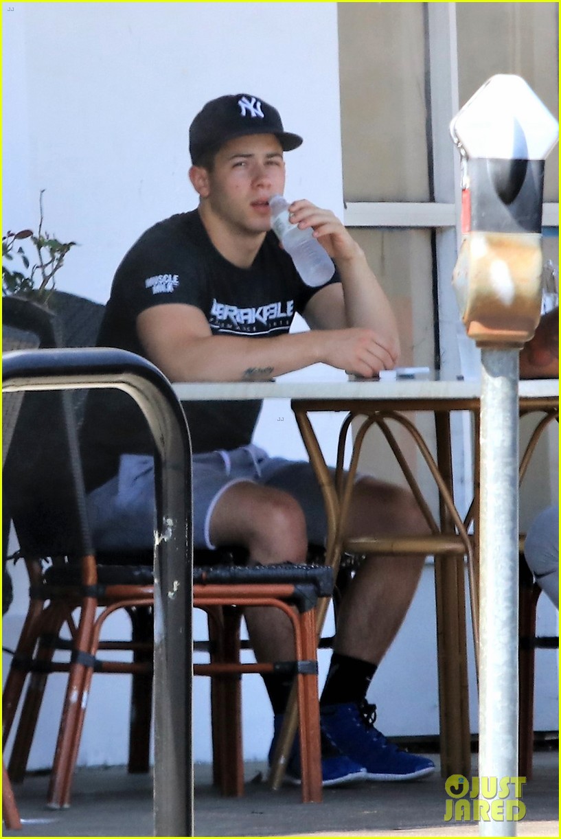 nick jonas shows off his buff arm muscles after a workout 02