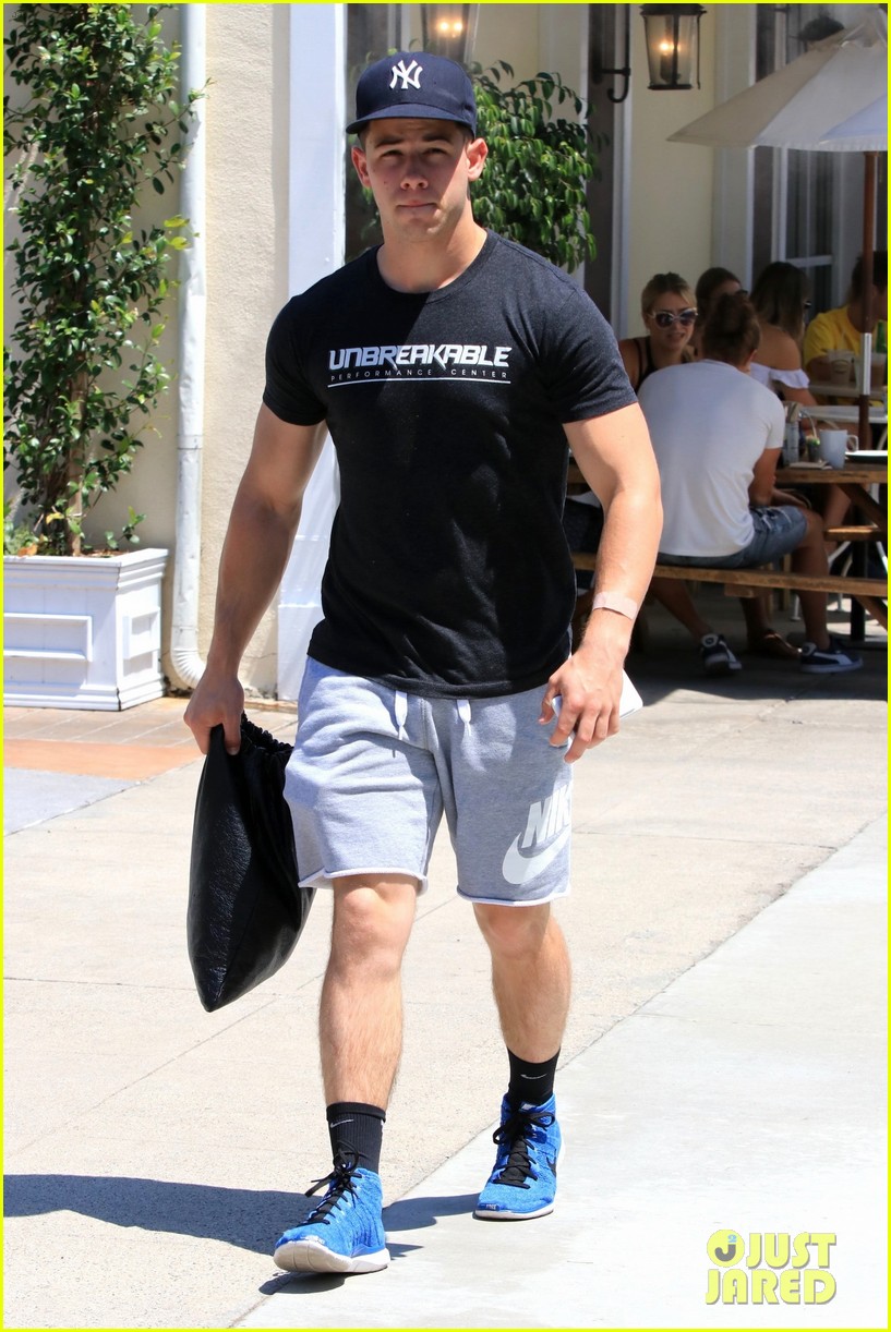 nick jonas shows off his buff arm muscles after a workout 06
