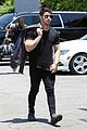 nick jonas shows off his buff biceps in a tight t shirt 04