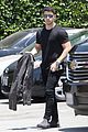 nick jonas shows off his buff biceps in a tight t shirt 08
