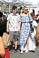 nolan gould hannah glasby hold hands famers market 03