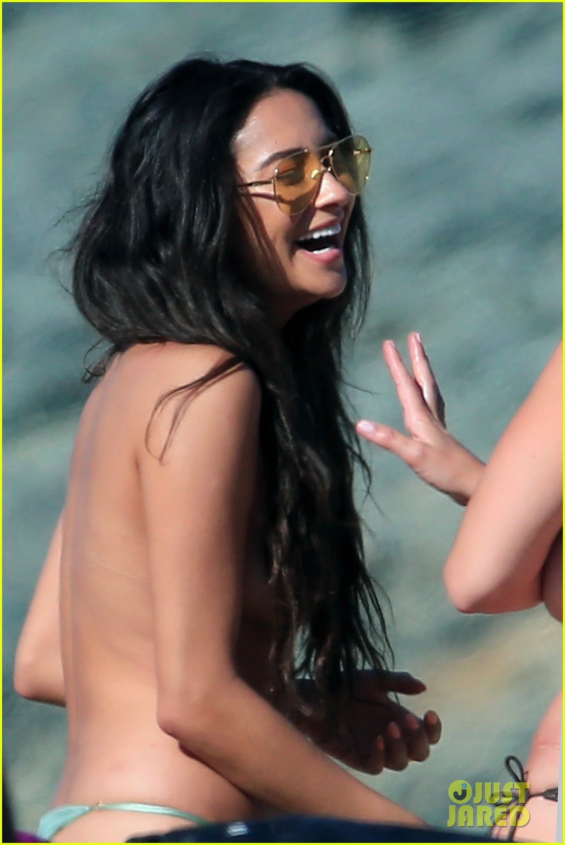 shay mitchell goes topless at the beach in greece 02