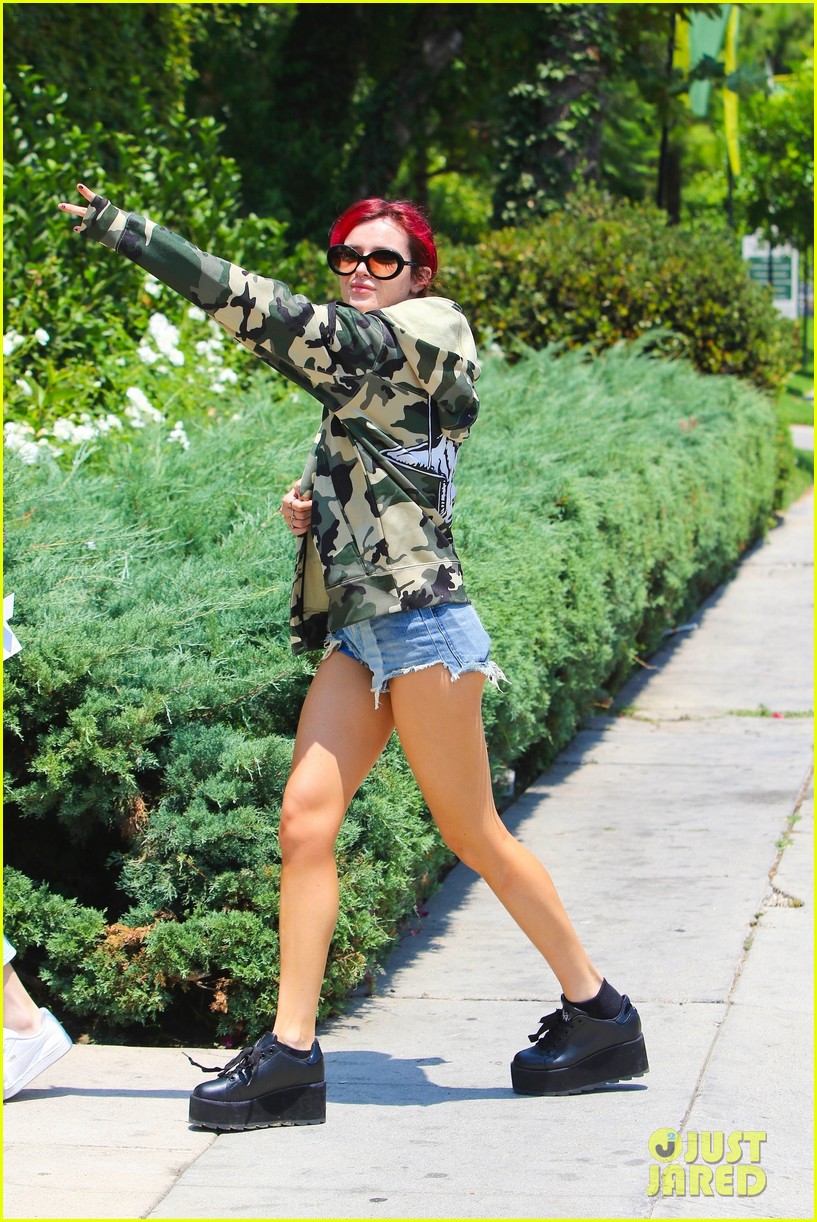 bella thorne leaves little to the imagination in plunging 28