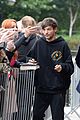 louis tomlinson takes selfies with fans while promoting back to you 11